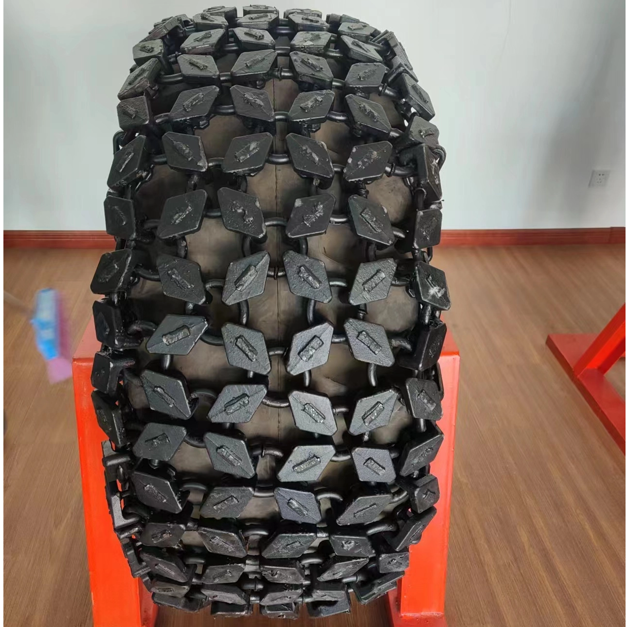 Cadena de protección de neumáticos de cargador